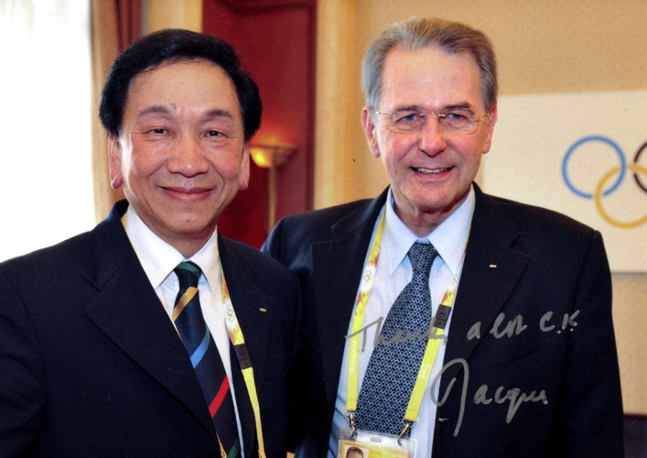 2013年5月17日吴经国先生与时任国际奥委会主席罗格合影
